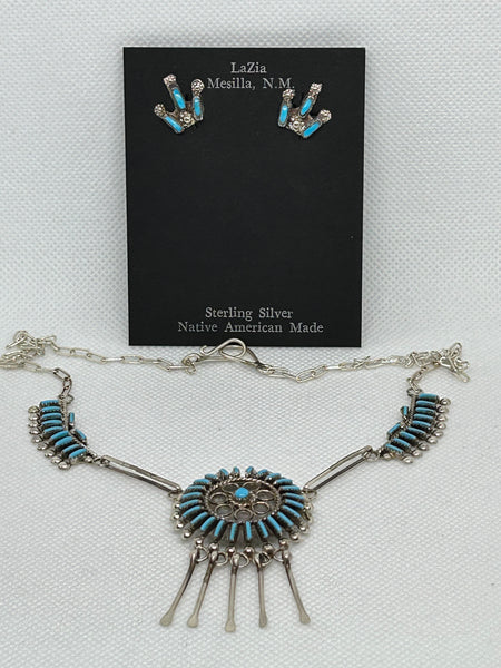 Zuni handcrafted in sterling silver and genuine turquoise stones.  LZ876