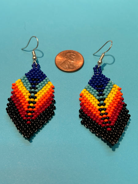 Guatemalan handcrafted glass seed beads earrings in feather design.