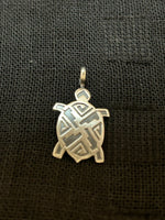 Native American handcrafted sterling silver turtle pendant. NM121