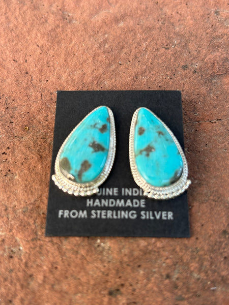 Verley Betone handcrafted these sterling silver and genuine Turquoise earrings. NM167