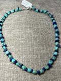 Genuine Campitos Turquoise with Genuine Lapis chips and sterling silver beads and clasp.  16” choker style by A.S.    AS606