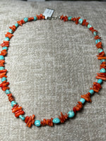 Genuine turquoise with red coral and sterling silver clasp.  18” long by A.S.    AS 603 FREE SHIPPING IN THE CONTINENTAL USA.