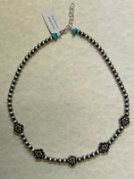 Sterling Silver necklace in oxidized beads and lotus flower beads.  Adjustable length from 15” to 17”. SR147