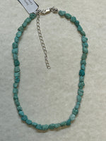 Genuine Campitos mine turquoise with sterling silver in an adjustable 14” to 16” length.  Great as a choker!  SR138