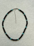 Genuine Black Onyx and turquoise 6mm beads with sterling silver in a 14” to 16” choker length.  SR 132