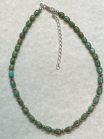 Genuine green Kingman turquoise in an adjustable choker length necklace. 14”-16”.  SR130