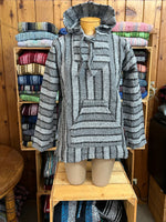 Baja pullover with hood and front pocket made from .recycled fibers. Size medium. Baja110