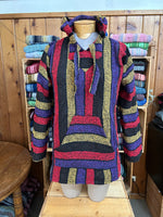 Baja pullover with hood and front pocket made from recycled fibers.  Baja112