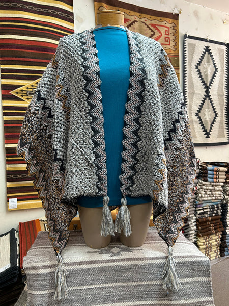 Poncho style open cape in cashmere style acrylic. P-14