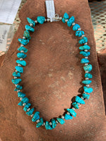 Genuine stabilized turquoise 16” choker style necklace with sterling silver beads and clasp. By A.S.AS 602