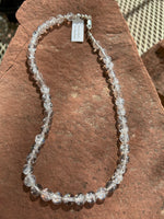Crystal Quartz beads with sterling silver in a 17” necklace.  JK26