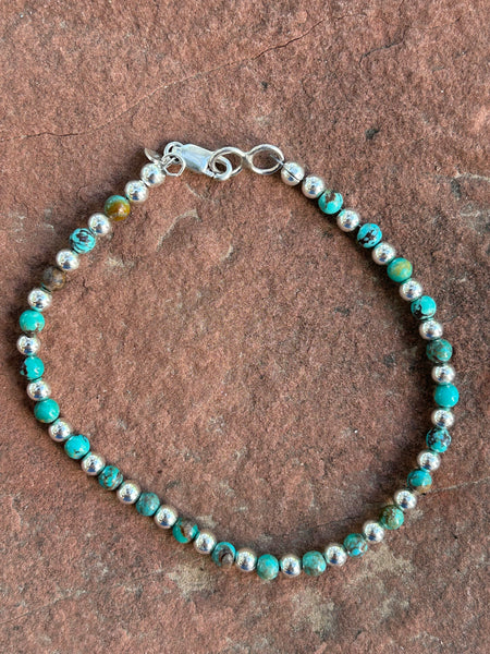 Natural African 4 mm stone beads with sterling silver.  7.5” bracelet SR111 FREE SHIPPING IN THE CONTINENTAL USA.