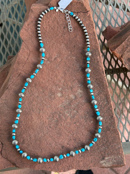 Navajo style pearls with genuine Kingman turquoise in an adjustable length from 23” to 25”. SR116