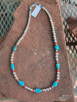 Genuine Campitos Turquoise with Spiney Oyster shell and Sterling Silver beads.SR119