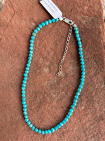 Genuine Kingman turquoise in an adjustable choker length of 14”-16” with sterling silver.  SR 139