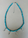 Genuine Kingman Turquoise with sterling silver blossom beads and clasps.  Adjustable from 17” to 19”.  AS714