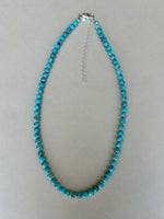 Genuine grade A Kingman turquoise with sterling silver in a 17” length. AS713