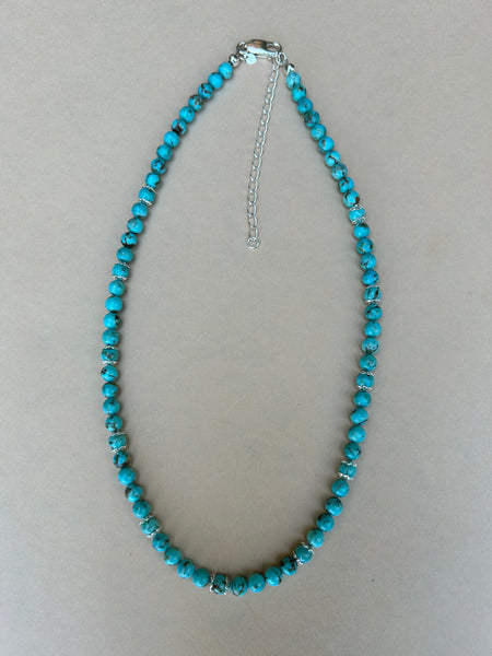 Genuine grade A Kingman turquoise with sterling silver in a 17” length. AS713