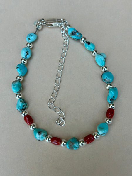 Campitos Turquoise with Italian red coral and sterling silver bracelet.  AS707. Adjustable from 7 to 8”