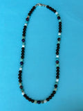Black onyx, purple tiger eye, mother of Pearl, sea sediment Jasper and sterling silver.  AS706