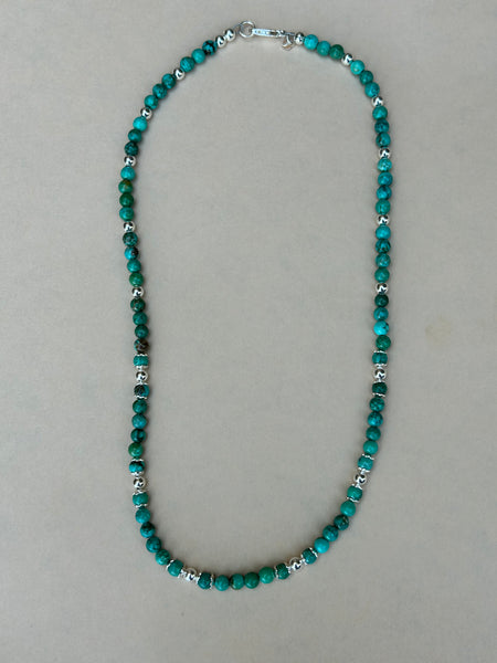 Genuine Turquoise 4mm stones with sterling silver in a 17” necklace. AS705