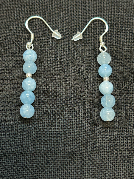 Genuine Aquamarine stones (6mm) with sterling silver earrings.