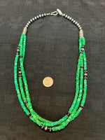 Kewa (Santo Domingo) handcrafted necklace, 3 strands in Chrysoface stone, with sterling silver.  23”.  LZ008