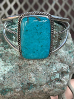 Navajo handcrafted sterling silver with turquoise bracelet. LZ060