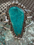 Navajo handcrafted sterling silver bracelet with genuine turquoise. LZ061