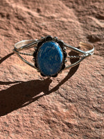 Navajo handcrafted sterling silver bracelet with Denim Lapis. LZ063