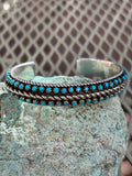 Navajo handcrafted sterling silver bracelet with genuine turquoise.  LZ064