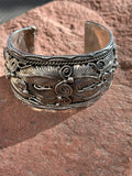 Navajo handcrafted Sterling Silver bracelet.  LZ071