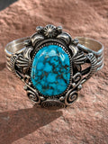 Navajo handcrafted sterling silver bracelet with genuine turquoise.  LZ041