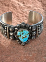 Navajo handcrafted sterling silver bracelet with genuine turquoise.  LZ043