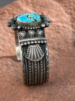 Navajo handcrafted sterling silver bracelet with genuine turquoise.  LZ043