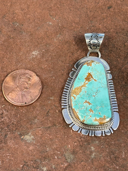 Navajo handcrafted sterling silver and genuine turquoise 2.25” top to bottom, LZ077