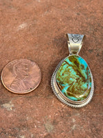 Navajo Handcrafted sterling silver and genuine turquoise pendant, 1.45” top to bottom, LZ095