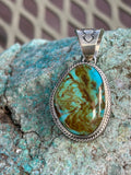 Navajo Handcrafted sterling silver and genuine turquoise pendant, 1.45” top to bottom, LZ095