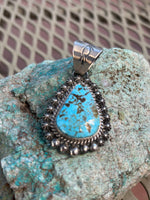 Navajo Handcrafted sterling silver and genuine turquoise pendant, 2” top to bottom, LZ098