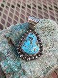 Navajo Handcrafted sterling silver and genuine turquoise pendant, 2” top to bottom, LZ098