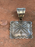 Navajo handcrafted sterling silver pendant, 3.25” top to bottom.  LZ103