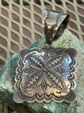 Navajo handcrafted sterling silver pendant, 3.25” top to bottom.  LZ103