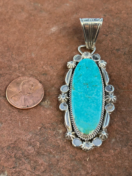Navajo handcrafted sterling silver and genuine turquoise, by Angie Platero, 2.5” top to bottom, LZ111