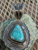 Navajo handcrafted sterling silver with genuine turquoise, by Hank Vanderer, 4.25” top to bottom, LZ116