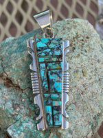Navajo handcrafted sterling silver and genuine turquoise inlay, 2.75” top to bottom,  LZ117
