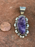 Navajo handcrafted sterling silver with Charoite, 2.25” top to bottom, LZ119