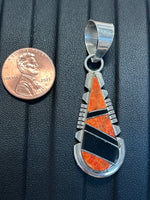 Navajo handcrafted sterling silver pendant with Spiney Oyster shell and Black Onyx. LZ278