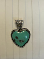 Navajo handcrafted sterling Silver pendant by Annette Martinez. Genuine Turquoise.LZ296