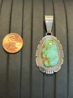 Navajo handcrafted sterling silver with genuine turquoise stone.  LZ299