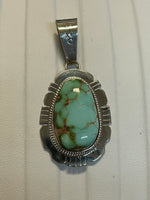 Navajo handcrafted sterling silver with genuine turquoise stone.  LZ299